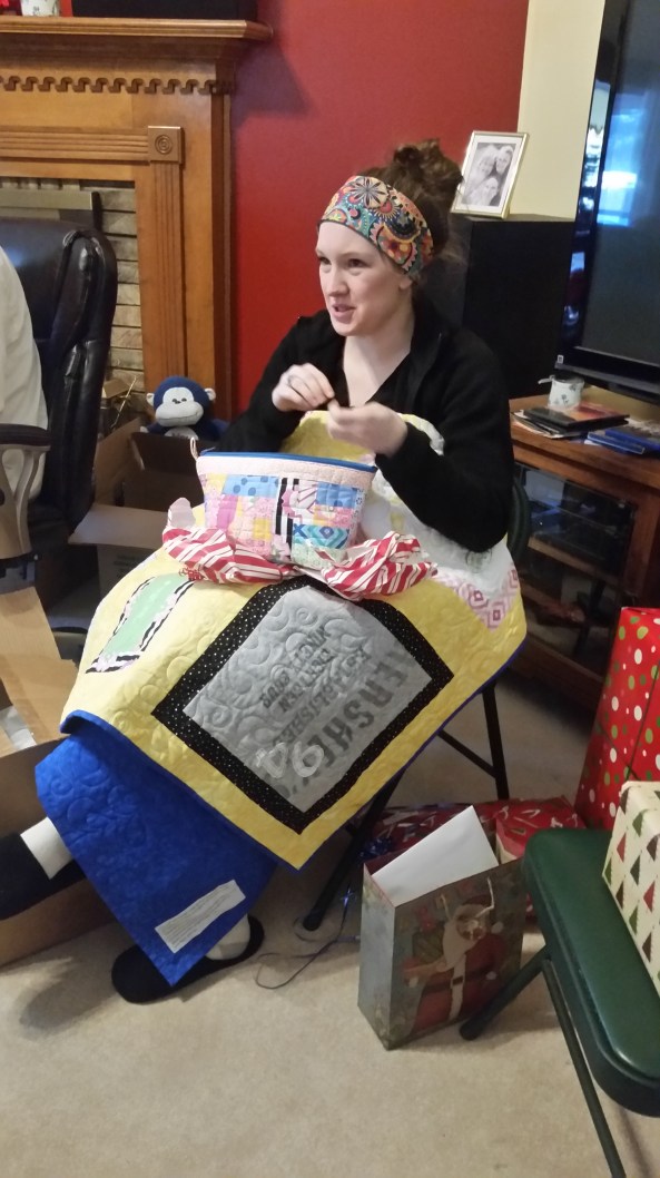 Ashley wrapped up in quilt